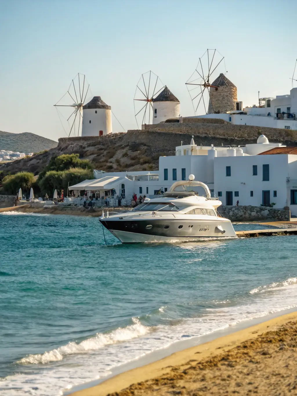 A luxurious yacht cruising through the Greek Islands at sunset, with whitewashed villages and ancient ruins visible on the hillsides.