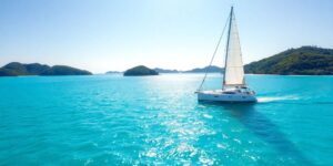 Sailboat on turquoise water, British Virgin Islands.