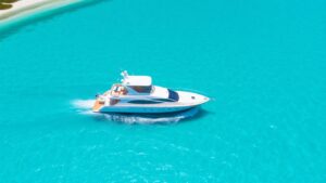 Luxury yacht sailing in Exumas turquoise waters.