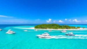 Charter boats sail near Belize islands under clear sky