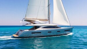 Majestic Seahawk sailboat on a calm, sunny sea.