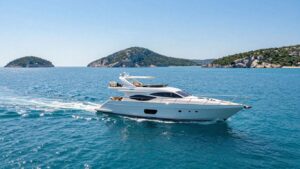 Yacht sailing on Adriatic Sea near Croatian islands.