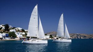 Sailboat in Greece with island backdrop