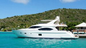 Luxury yacht docked at The Moorings, Tortola, with clear blue waters.