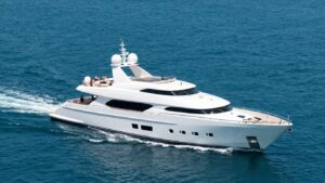 Luxurious 80-meter superyacht sailing on the ocean.
