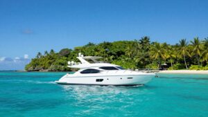 Luxury yacht sailing in clear turquoise waters near St. Thomas.