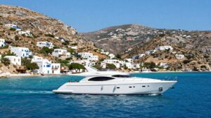 Yacht sailing in the Aegean Sea near Greek islands.