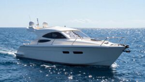 Used small yacht sailing on blue water.