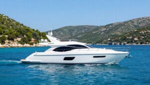 Yacht sailing in Croatia with islands in background.