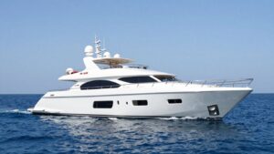 Feadship M/Y AIR luxury yacht sailing on blue water.