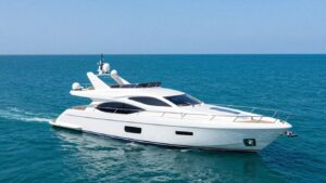 M/Y Dream yacht sailing on a calm turquoise ocean.