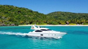 Yacht sailing in US Virgin Islands turquoise waters.