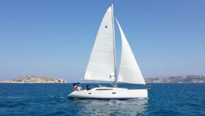 Sailboat on Aegean Sea near Greek islands